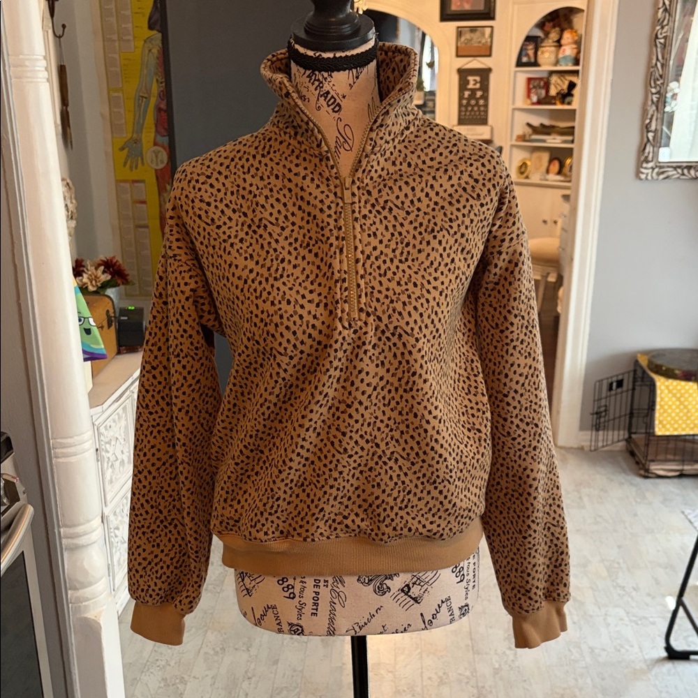 Fabletics Women's Cozy Fleece Half Zip Sweatshirt in a leopard or cheetah print